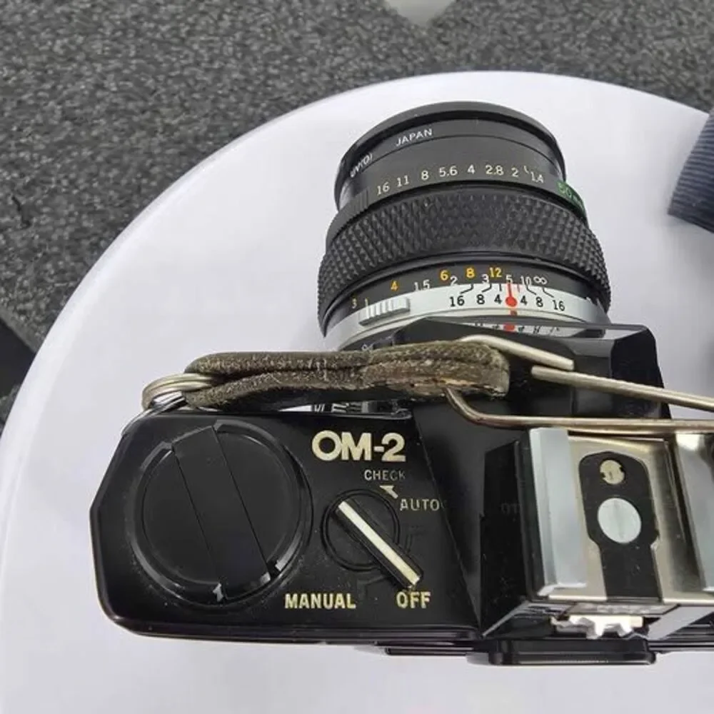 Olympus OM-2 35mm Film Camera + Zuiko 50mm f/1.4 Lens Silver